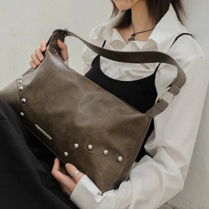 IUGAMAKARAS Studded Hobo Bag
